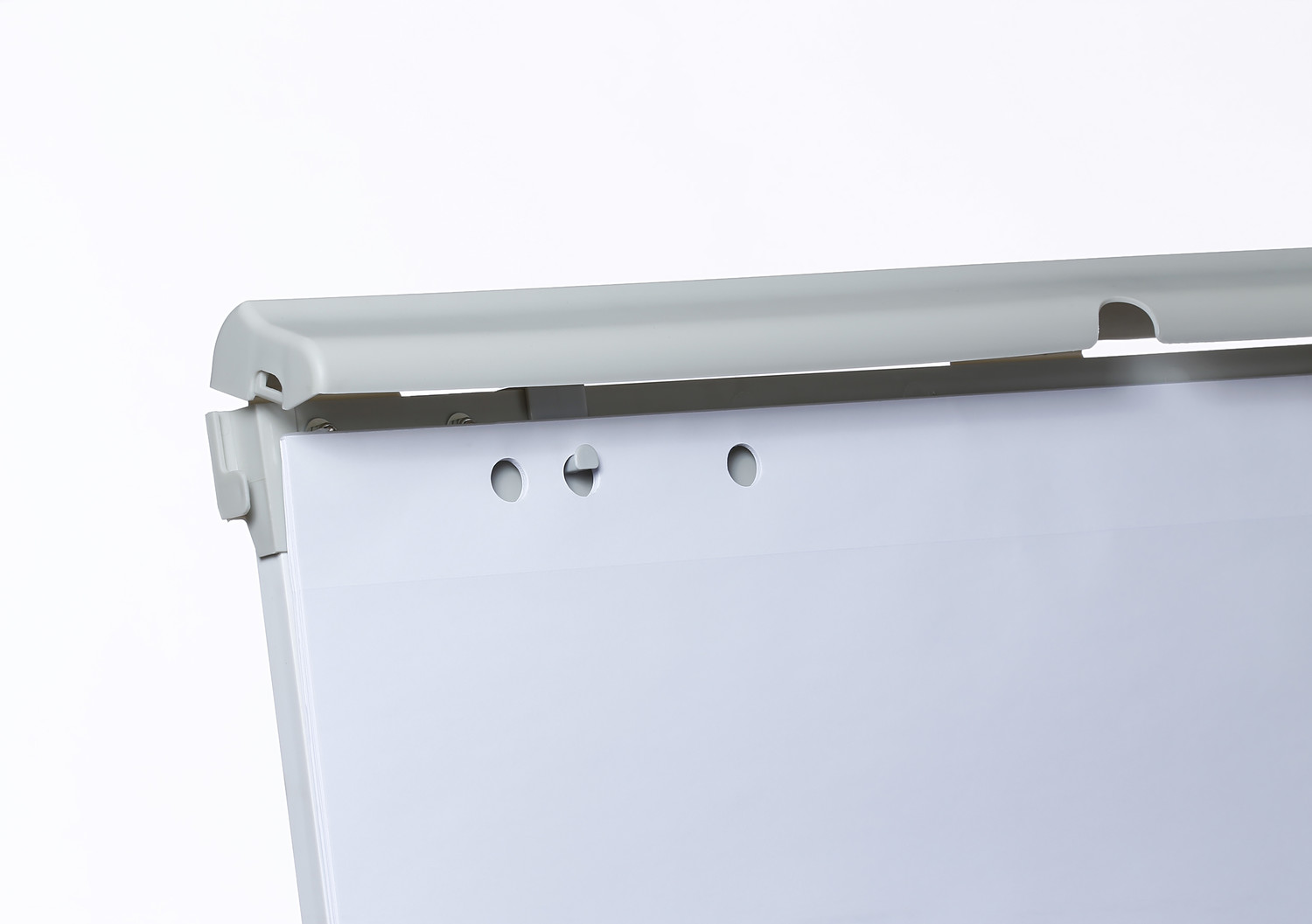 Commonly used flip chart pads can be securely attached to the hidden pad holder with adjustable pins