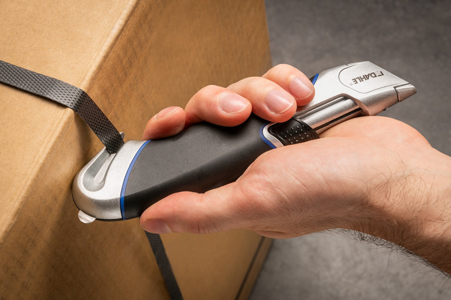 Easily open packages and shipments with the integrated package tape cutter